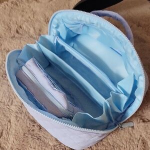 Light Blue Quilted Cosmetic Organizer Bag with Multiple Compartments